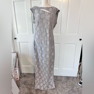 Womens evening gown, floor length Size 12. Silver with sequins side slit